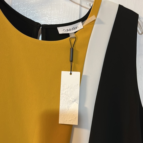 Sweater coat and sleeveless shell. - Picture 2 of 3